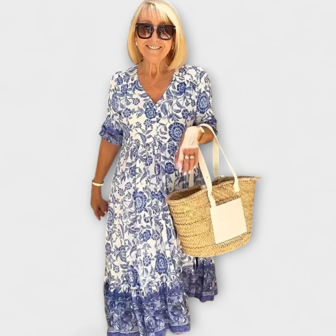 Caitlin - Elegantní květinové šaty s vzdušným designem Modrá